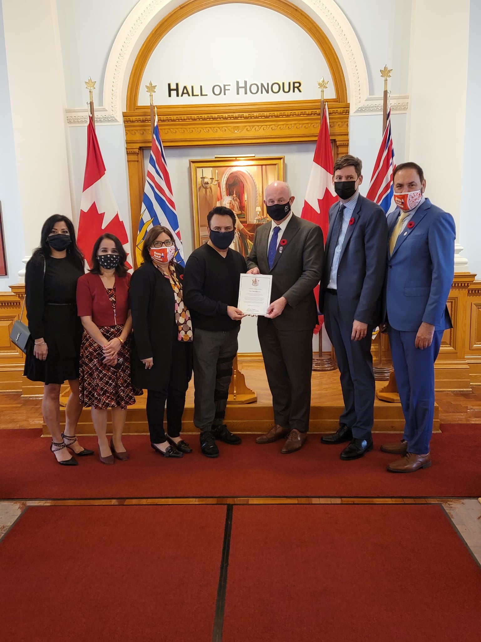 Luv Randhawa Receives the British Columbia Pin from  the Honourable Raj Chouhan Speaker of the British Columbia Legislative Assembly